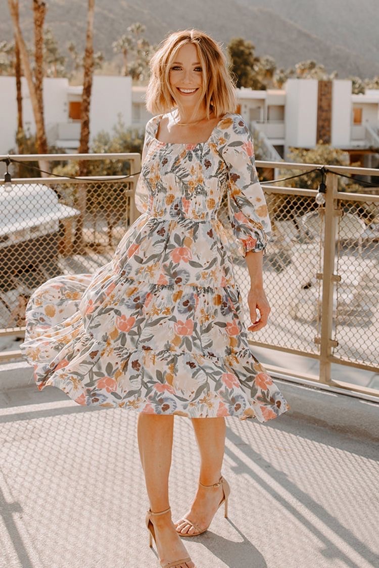 Flowy, floral dress engagement outfit for women