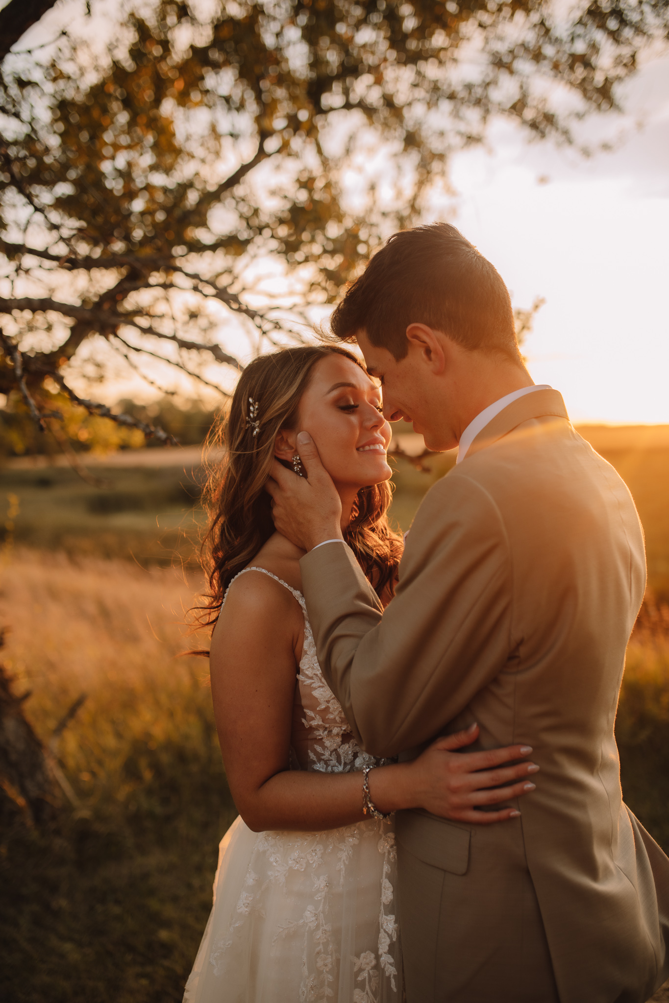 Sunset portraits of bride and groom at Lone Oak Farm Wedding Venue in North Dakota