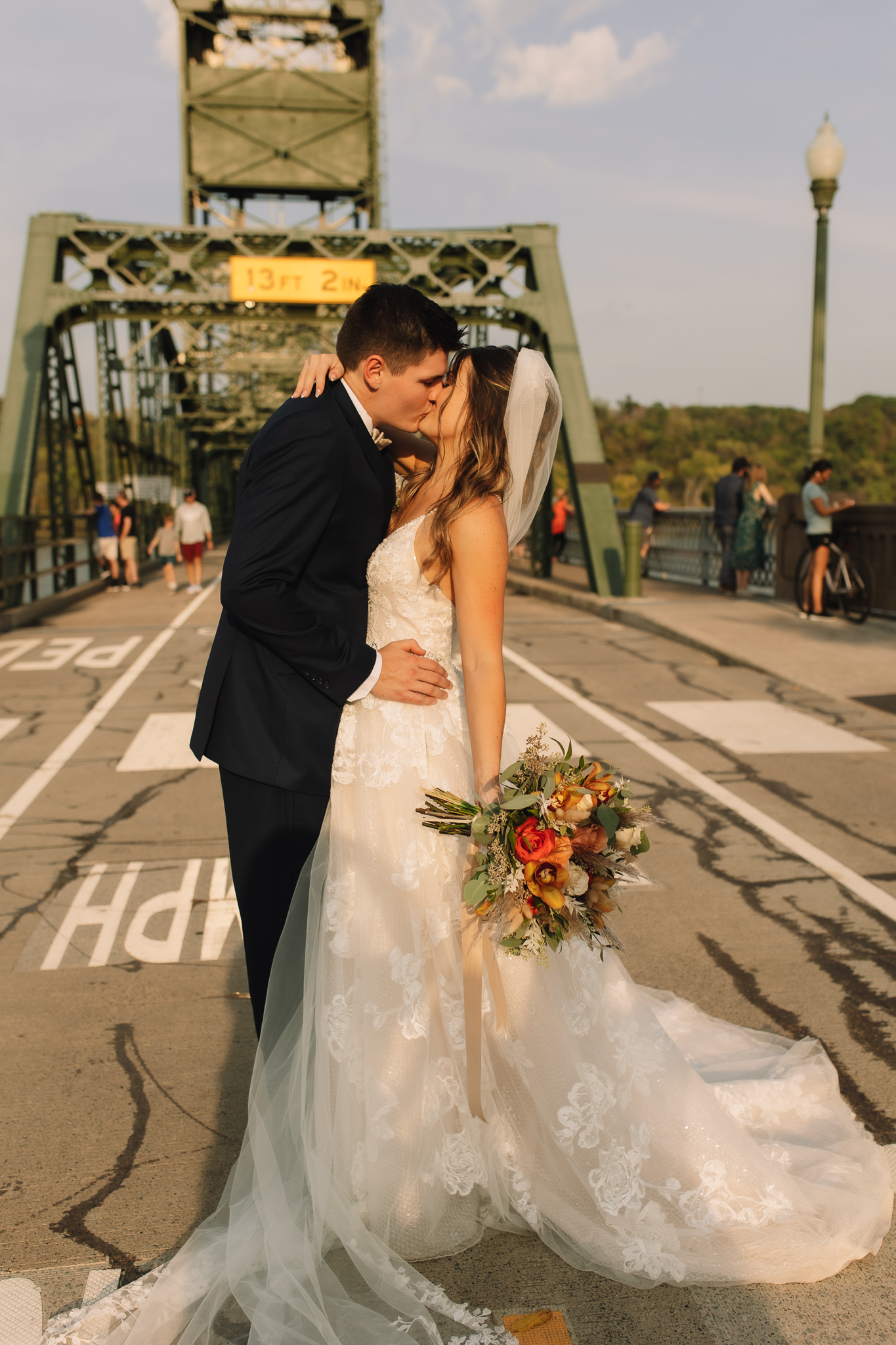 Bride and Groom Portraits on the Stillwater bridge overlooking the St. Croix River