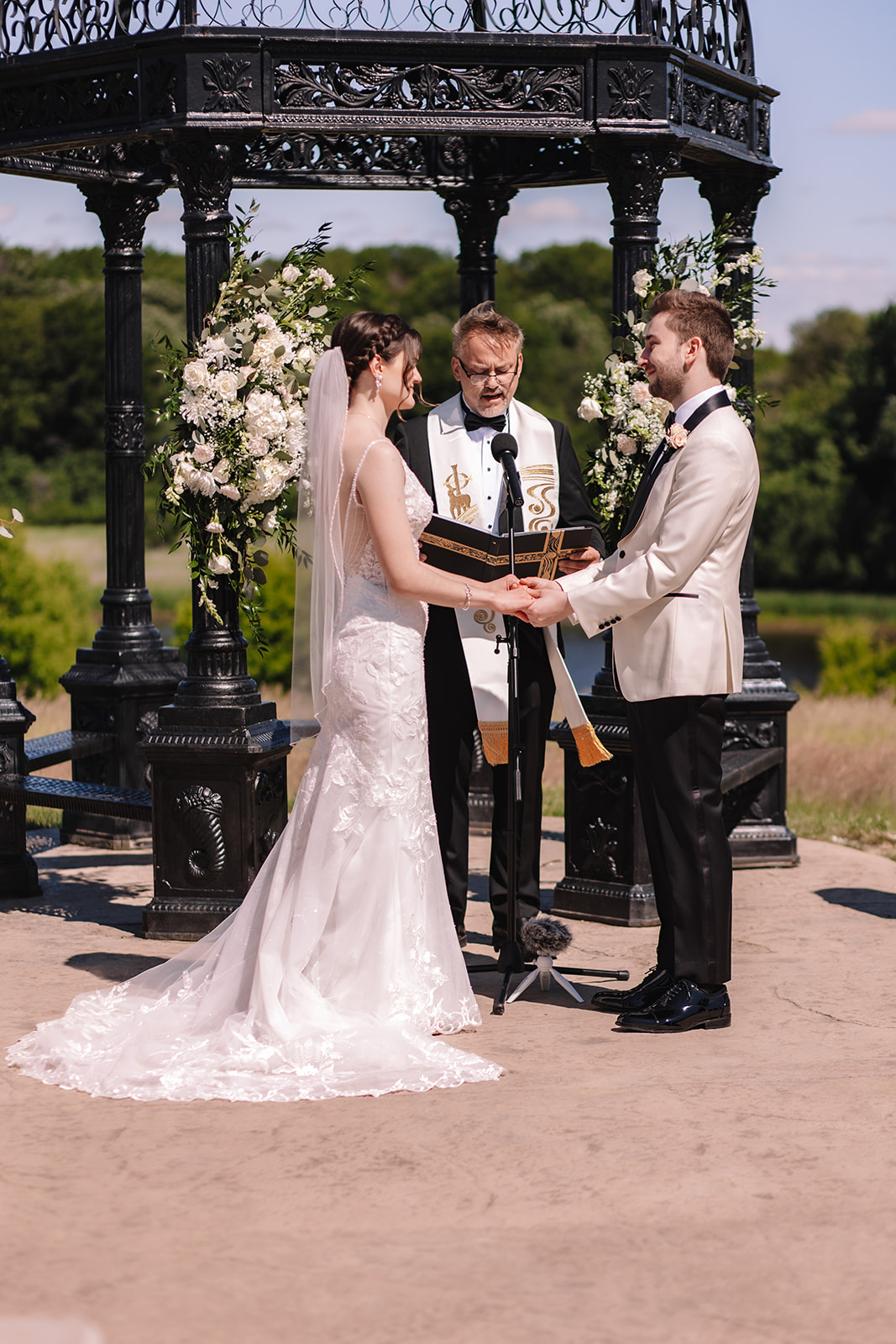 Bride and groom exchanging vows during wedding ceremony at Edward Anne Estate at Bavaria Downs