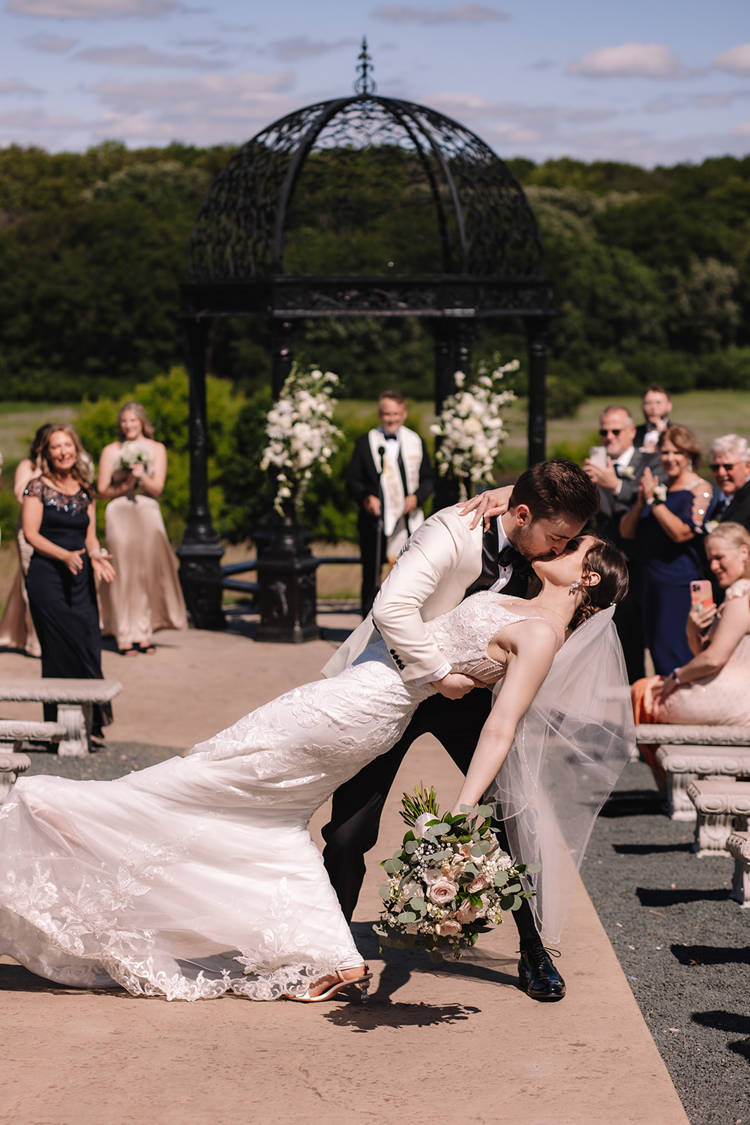 Bride and groom kissing after their wedding ceremony at Edward Anne Estate at Bavaria Downs