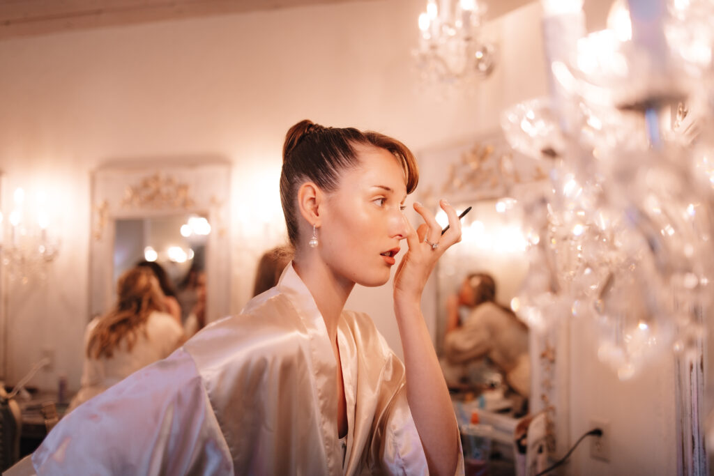 Bridesmaid getting ready at Edward Anne Estate wedding venue in Minnesota