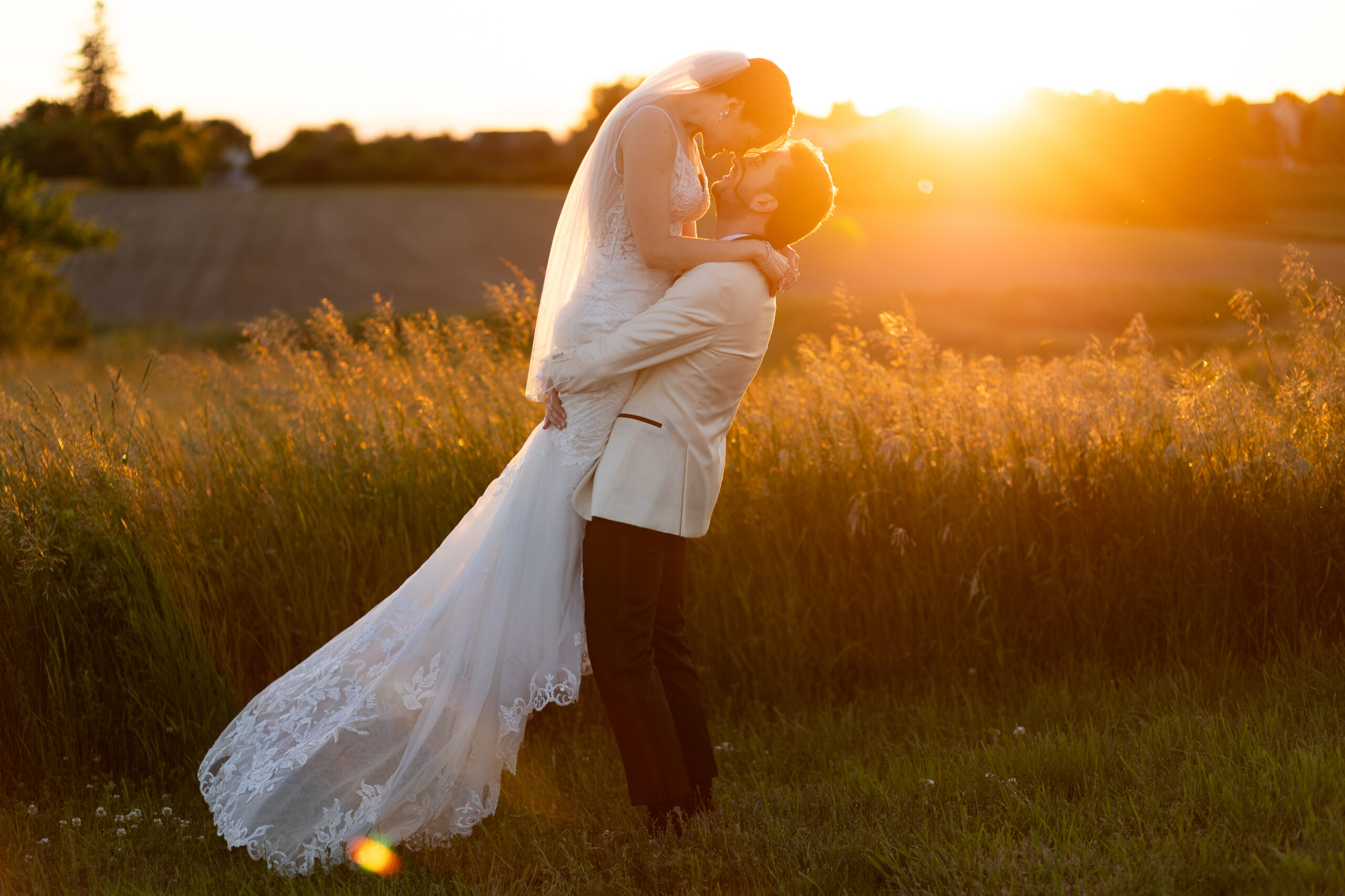 Bride and groom posing during sunset at Edward Anne Estate Wedding Venue in Minnesota