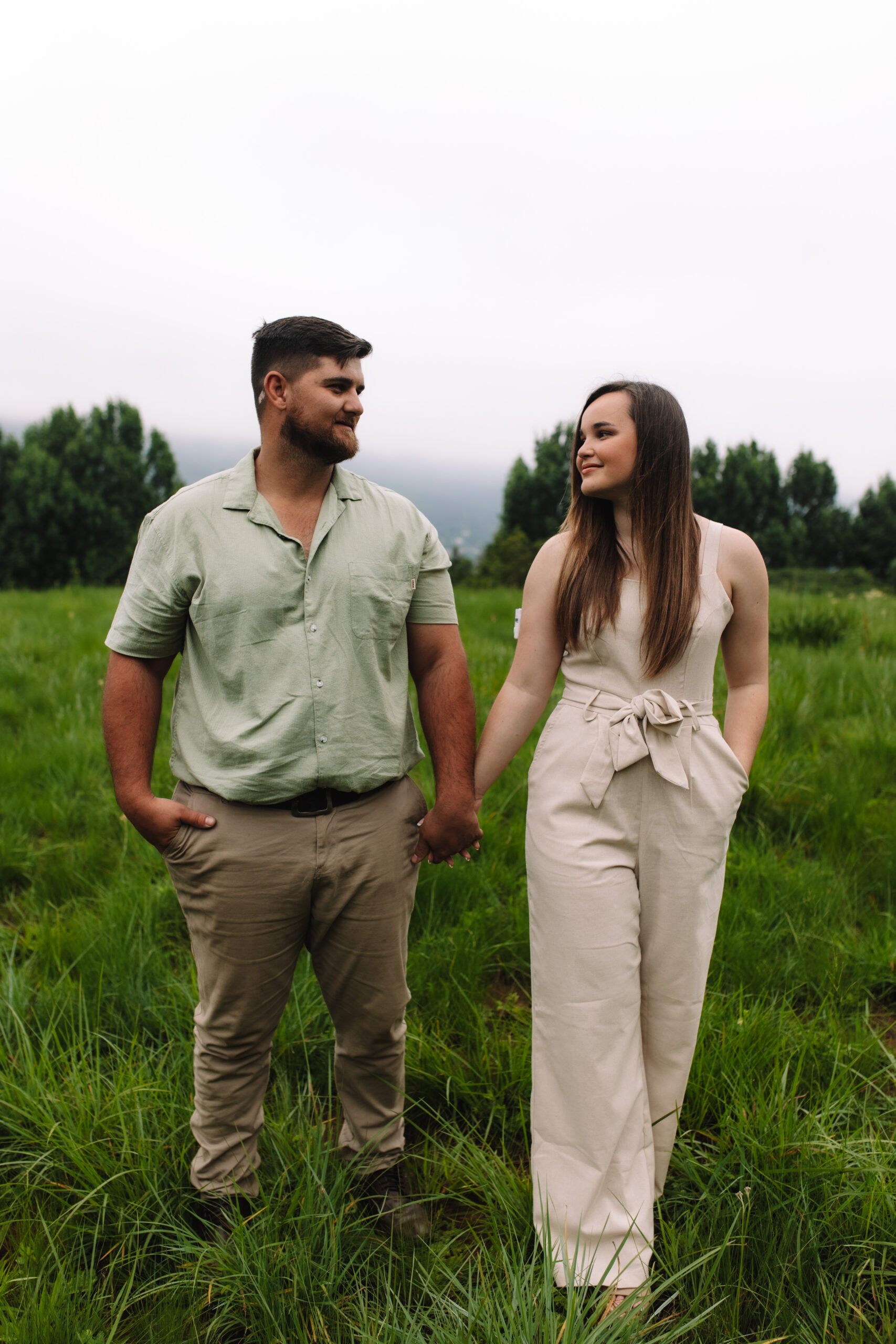 Engaged couple wearing earthy tones for their engagement photos in Minneapolis