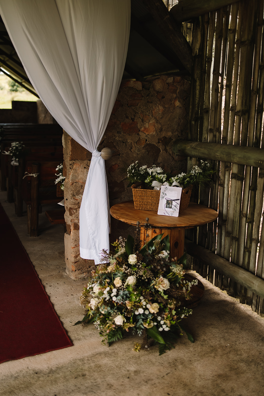 Rustic wedding ceremony decor and florals 