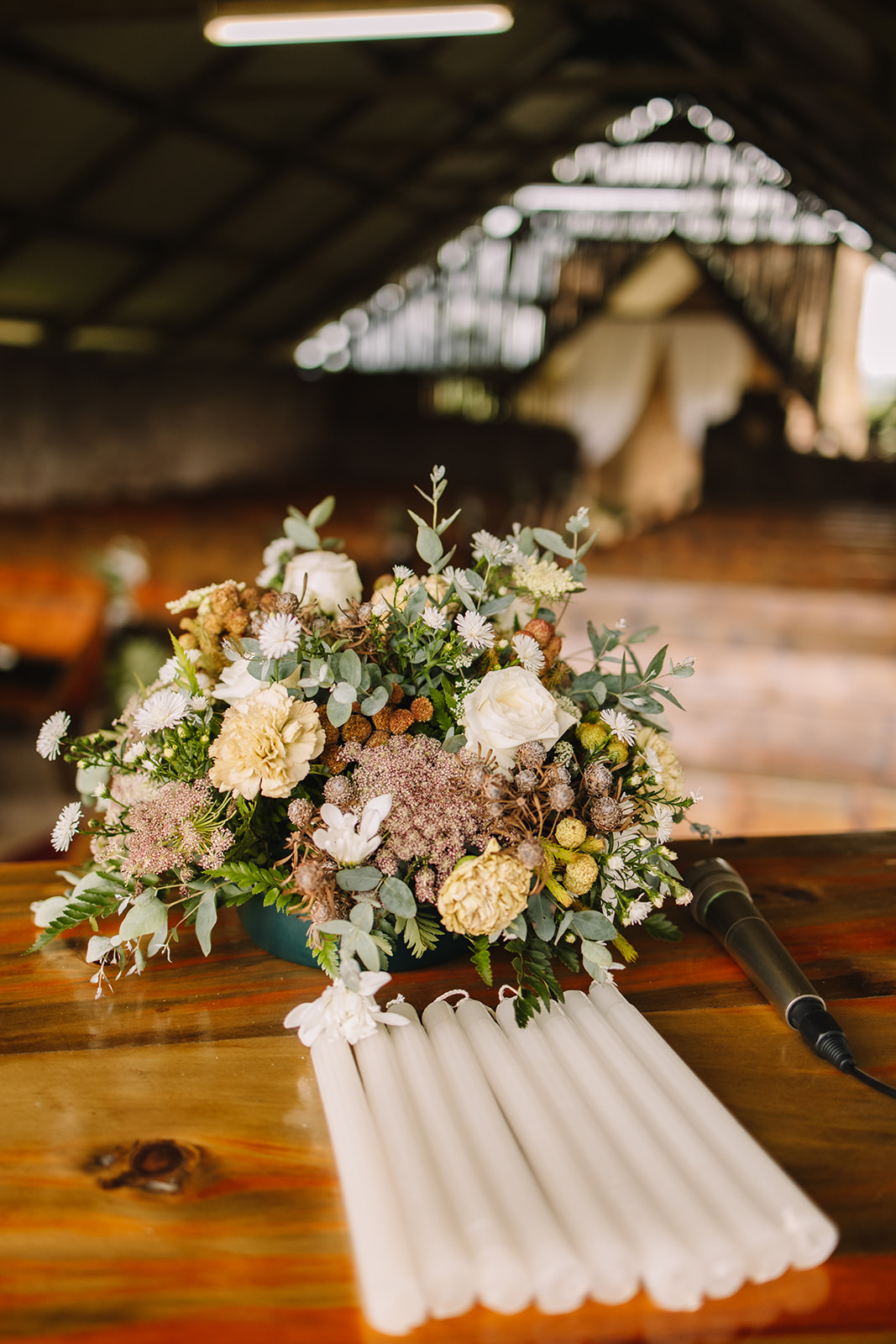 Floral bouquet and candles for wedding ceremony 