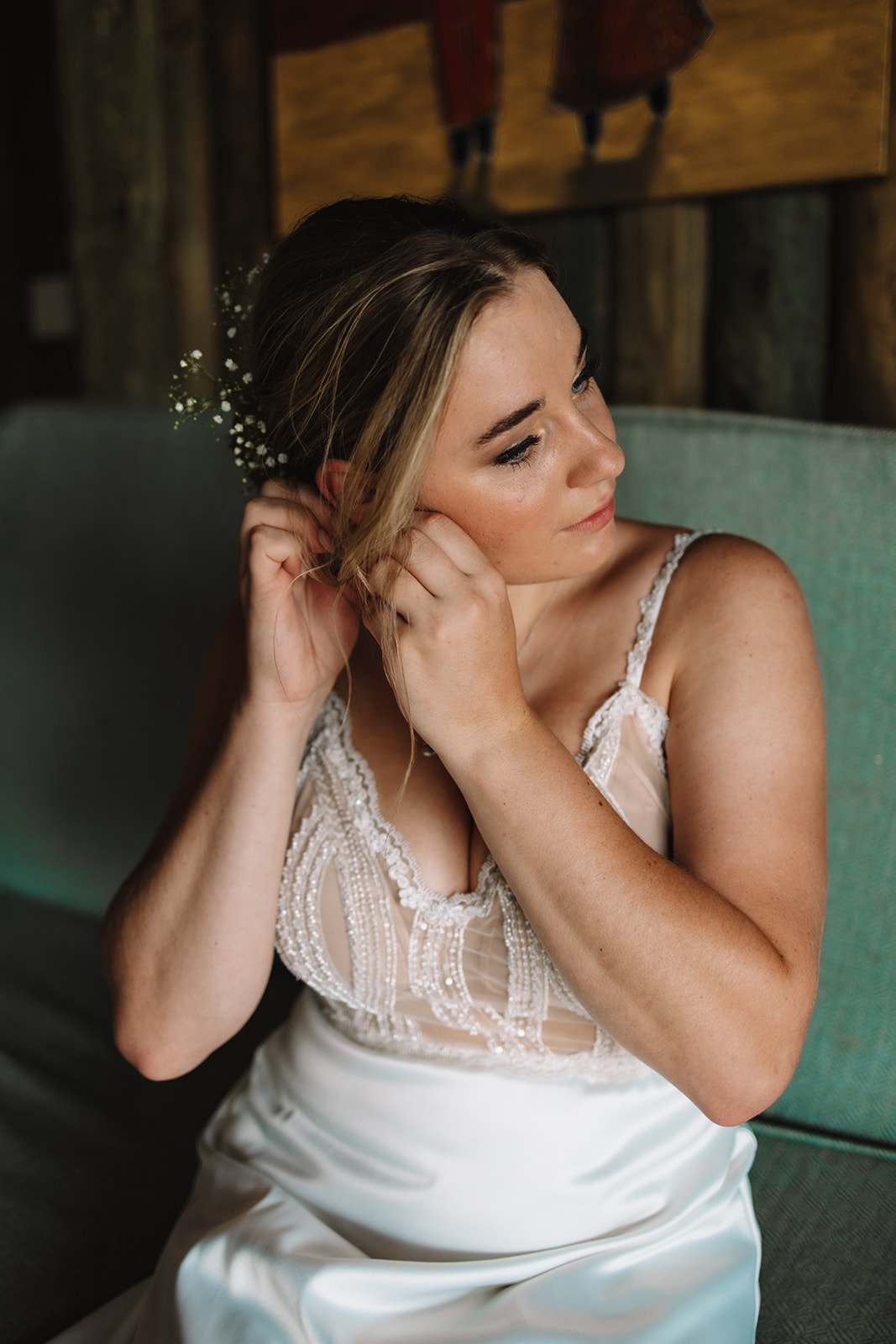 Bride getting ready at a sleeper chalet at Lake eland for her destination wedding in South Africa