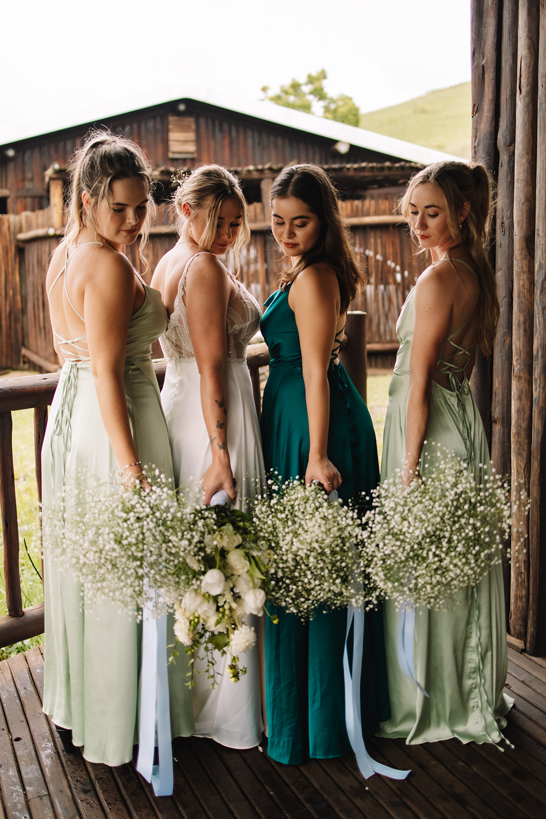 Bride and bridesmaids posing for their bridal party photos