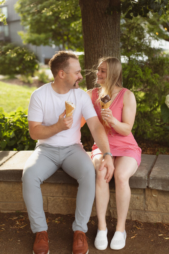 Engagement couple in Excelsior sharing an ice cream together