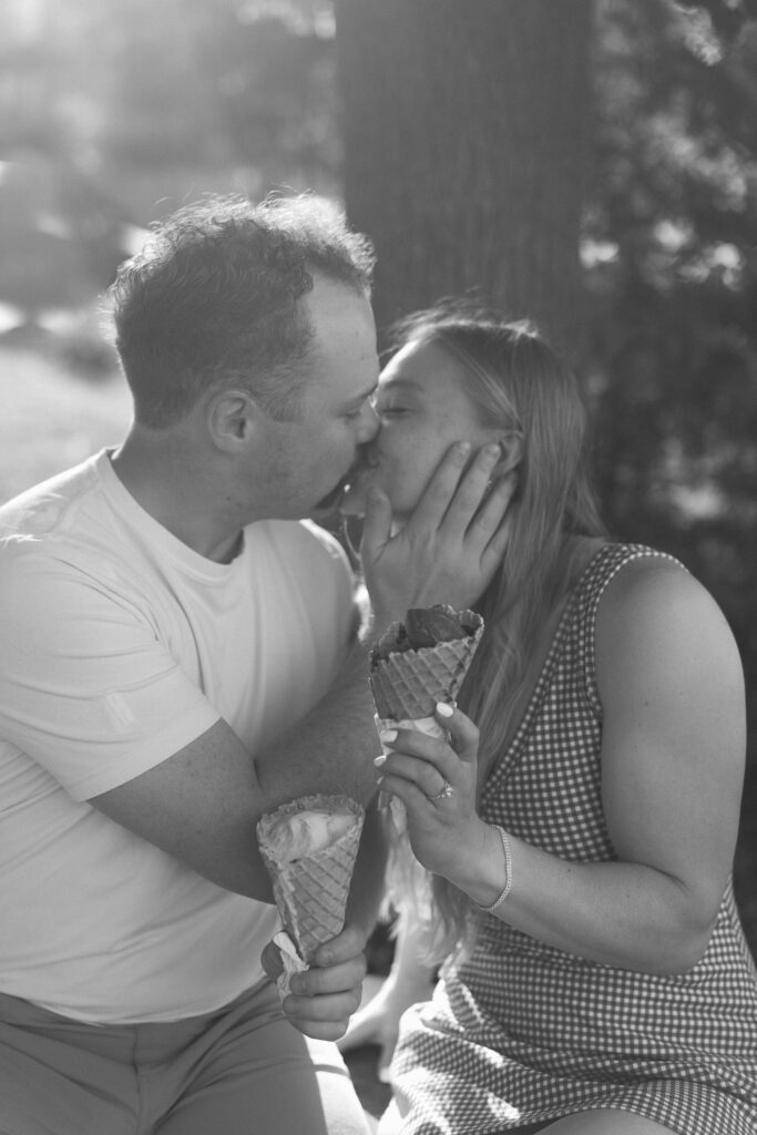 Engagement couple kissing during their photo session in Excelsior