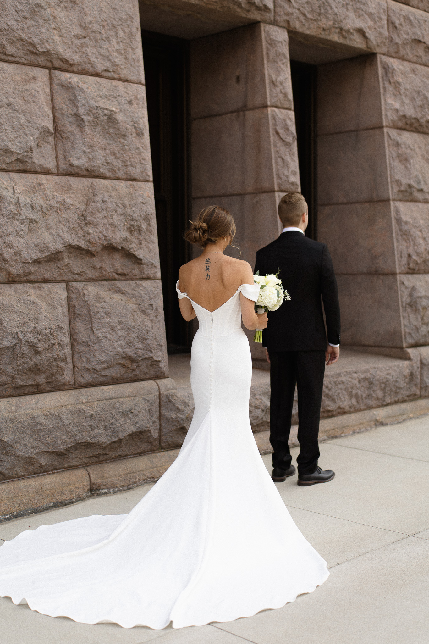 Bride and Groom first look outside the Minneapolis City Hall