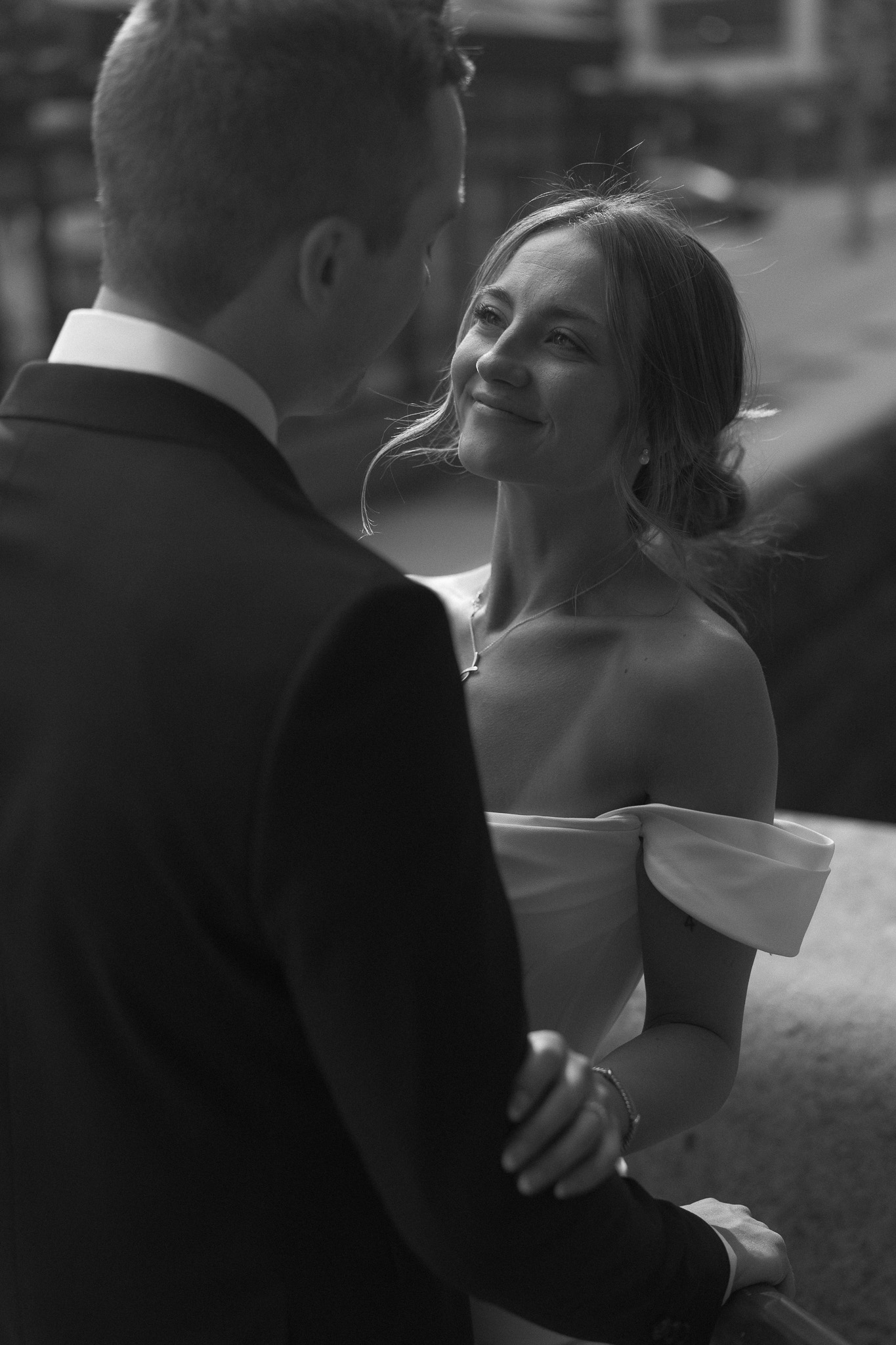 Bride and groom Black and White portrait photo of bride looking at her groom