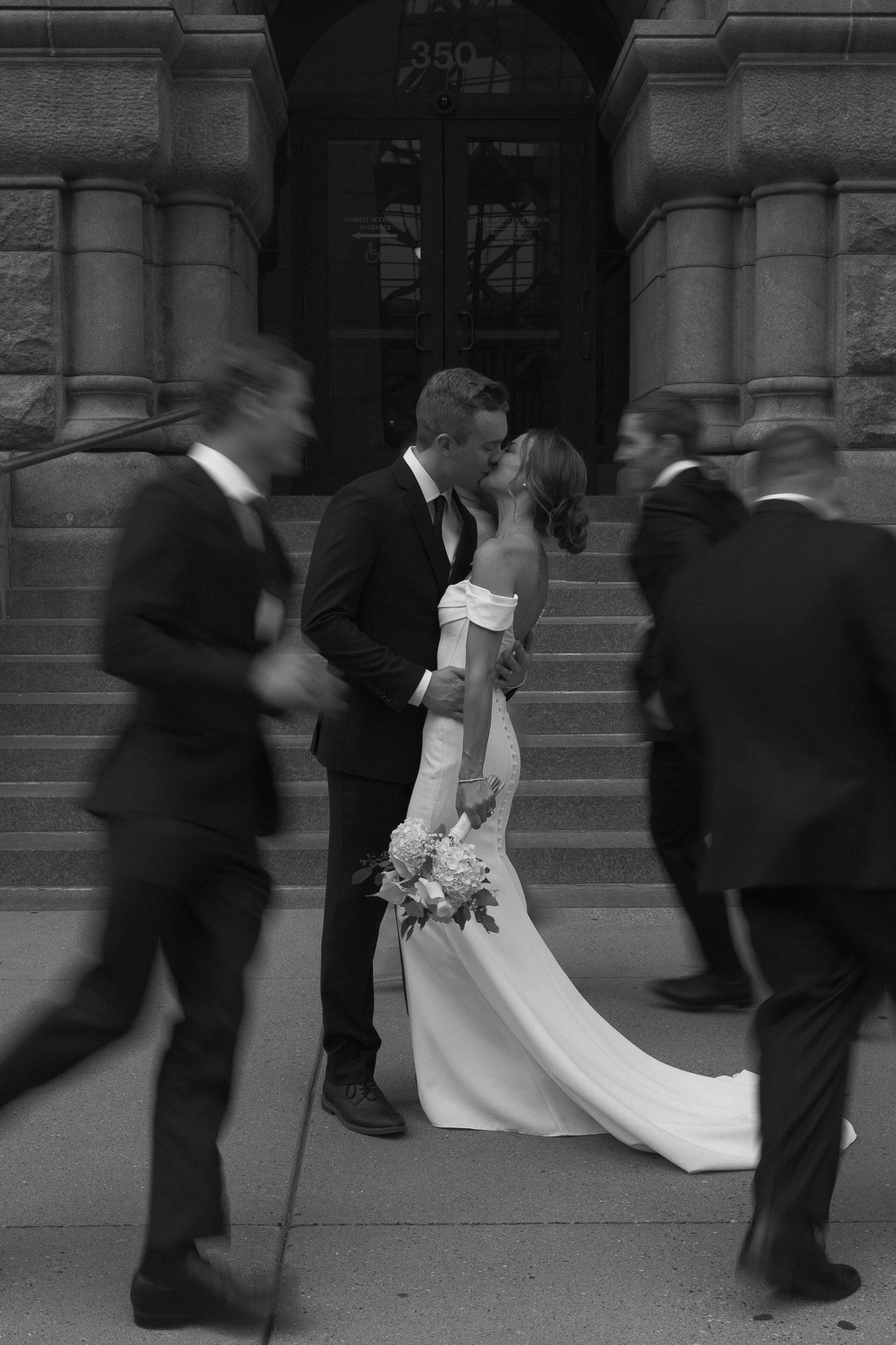 Documentary, cinematic black and white photo of courthouse elopement in Minneapolis
