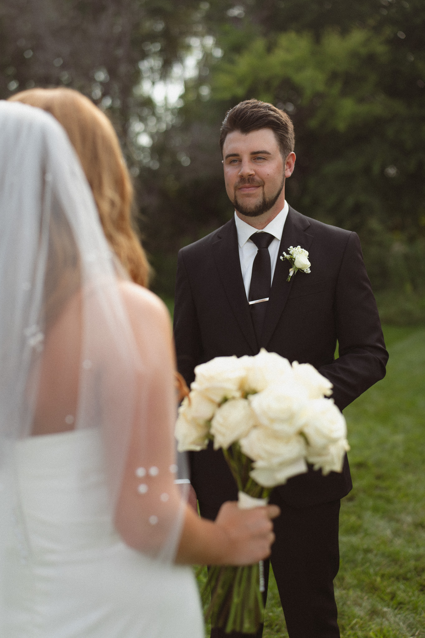 Wedding Couple having their first look at The Lafayette Club in Wayzata