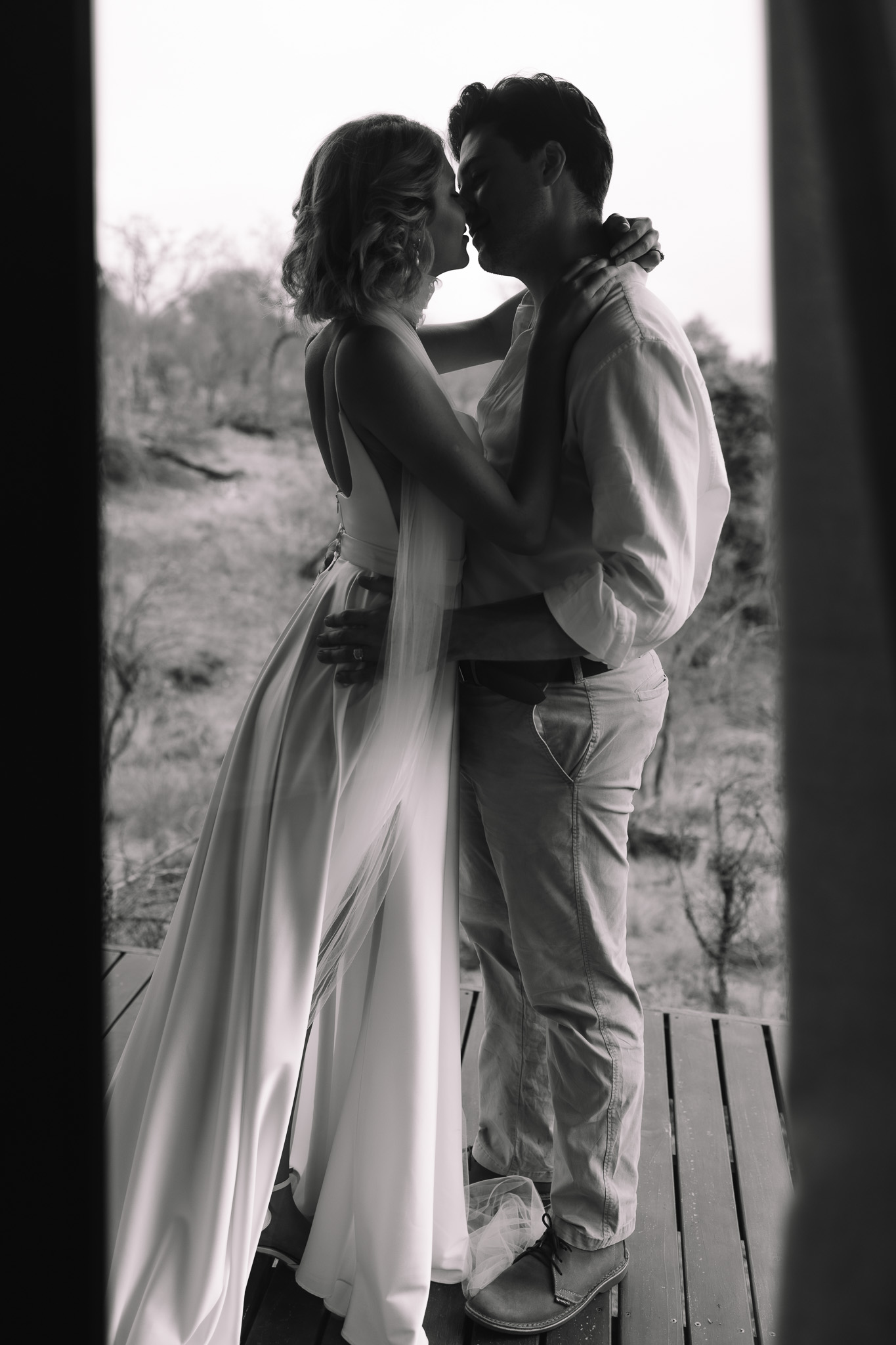 Bride and groom getting ready portraits at their private, secluded safari suite