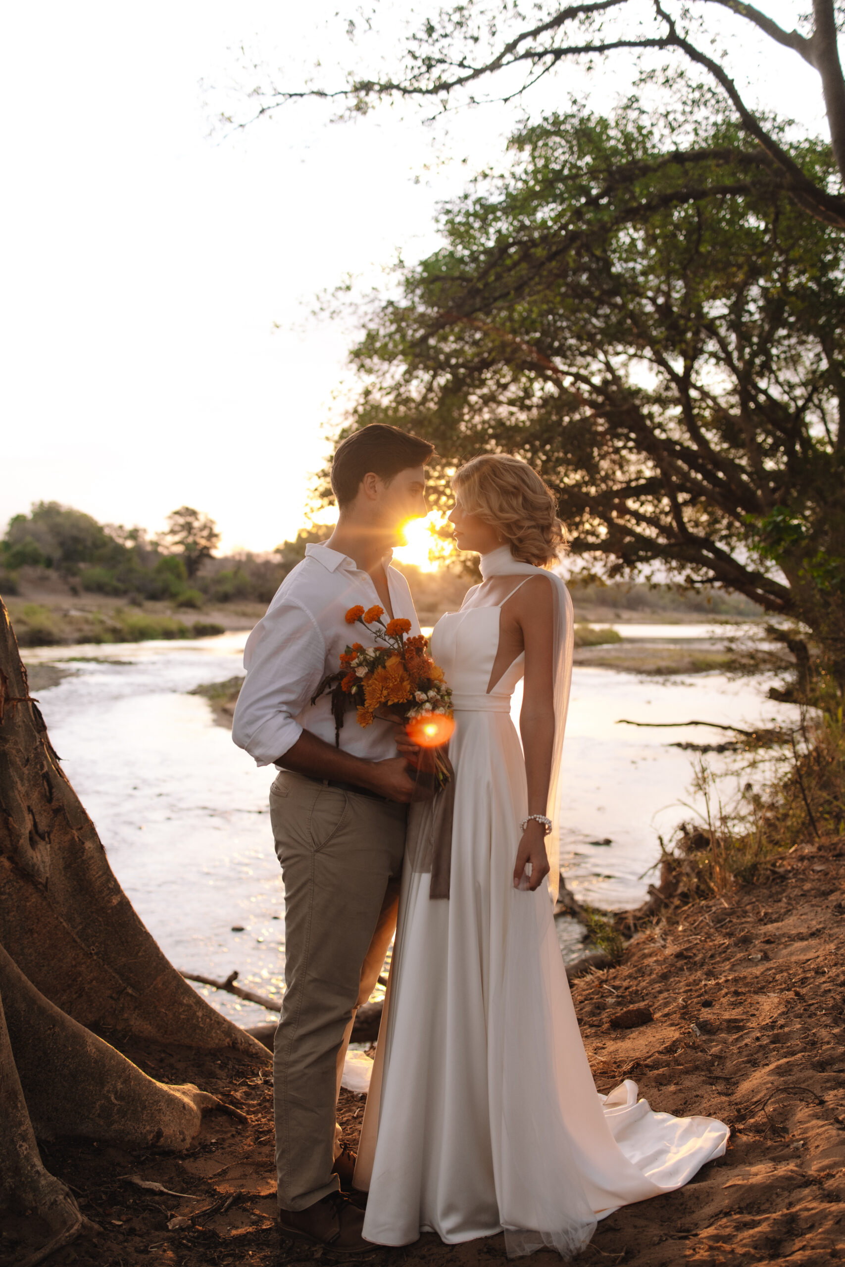 Intimate safari wedding ceremony under a marula tree in Sabi Sands Game Reserve
