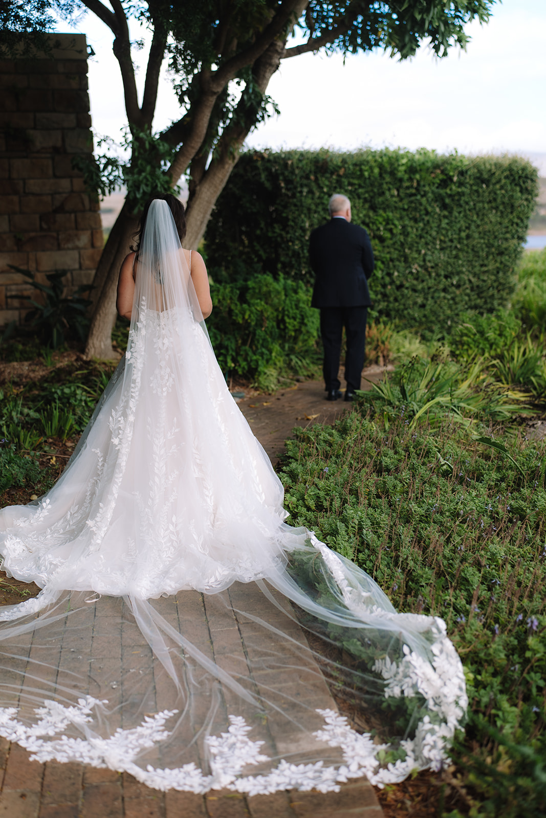 Bride walking to her groom for a first look before their Cape Town destination wedding