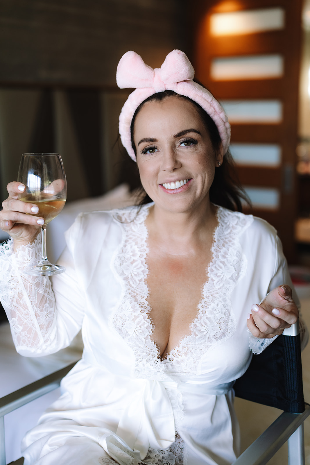Bride toasting champagne before her Betty’s Bay wedding day