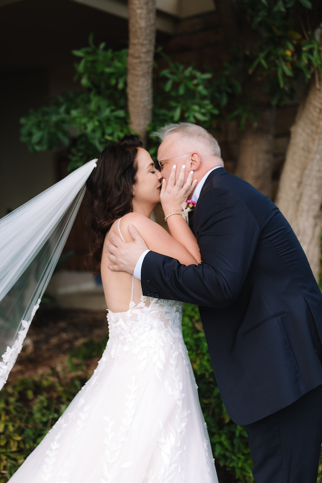 Newlyweds sharing a kiss before their Betty’s Bay elopement ceremony