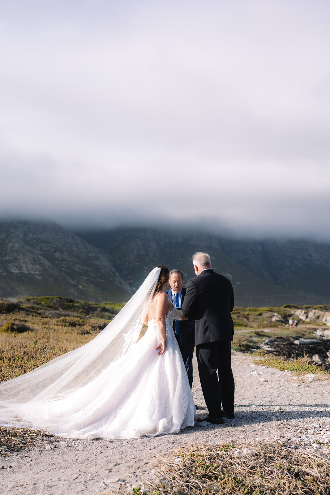 Intimate oceanfront ceremony at Stony Point Nature Reserve in Cape Town