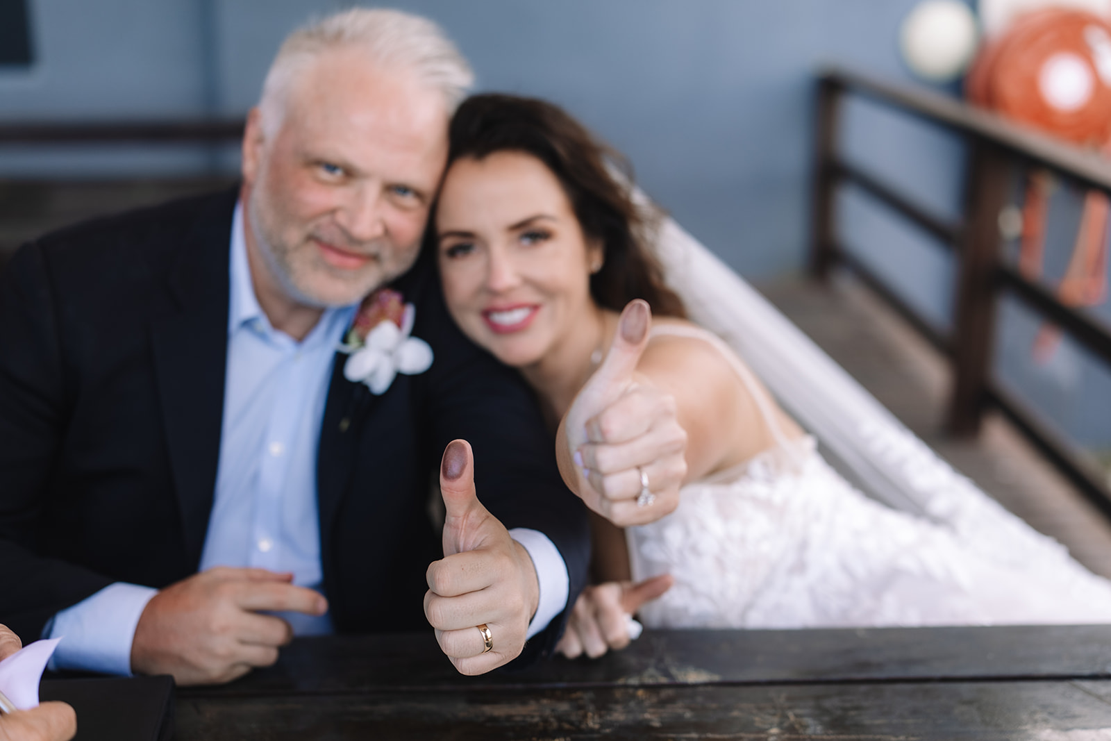 Just married couple celebrating after signing papers at Stony Point