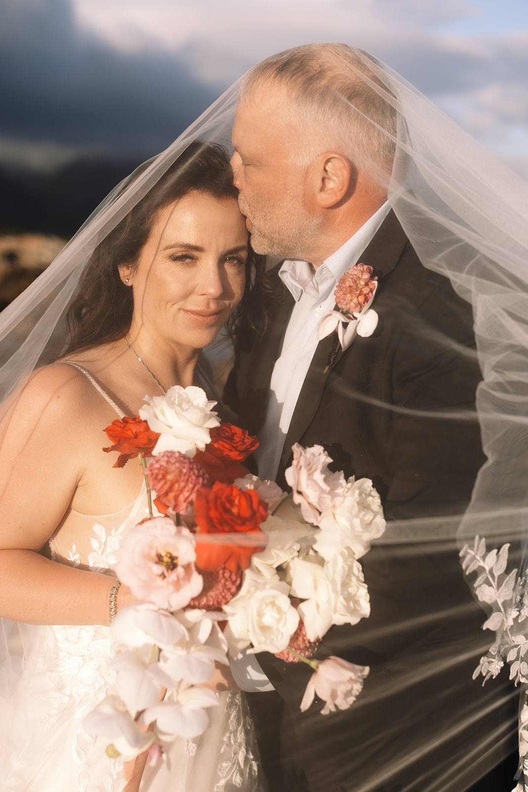 Romantic veil portrait during a stony point nature reserve wedding at sunset