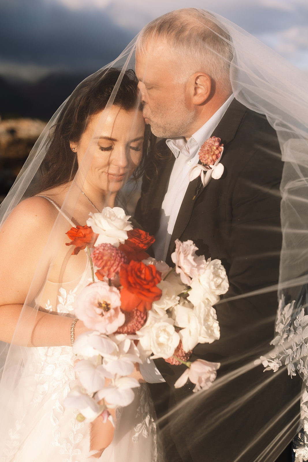 Romantic veil portrait during a stony point nature reserve wedding at sunset