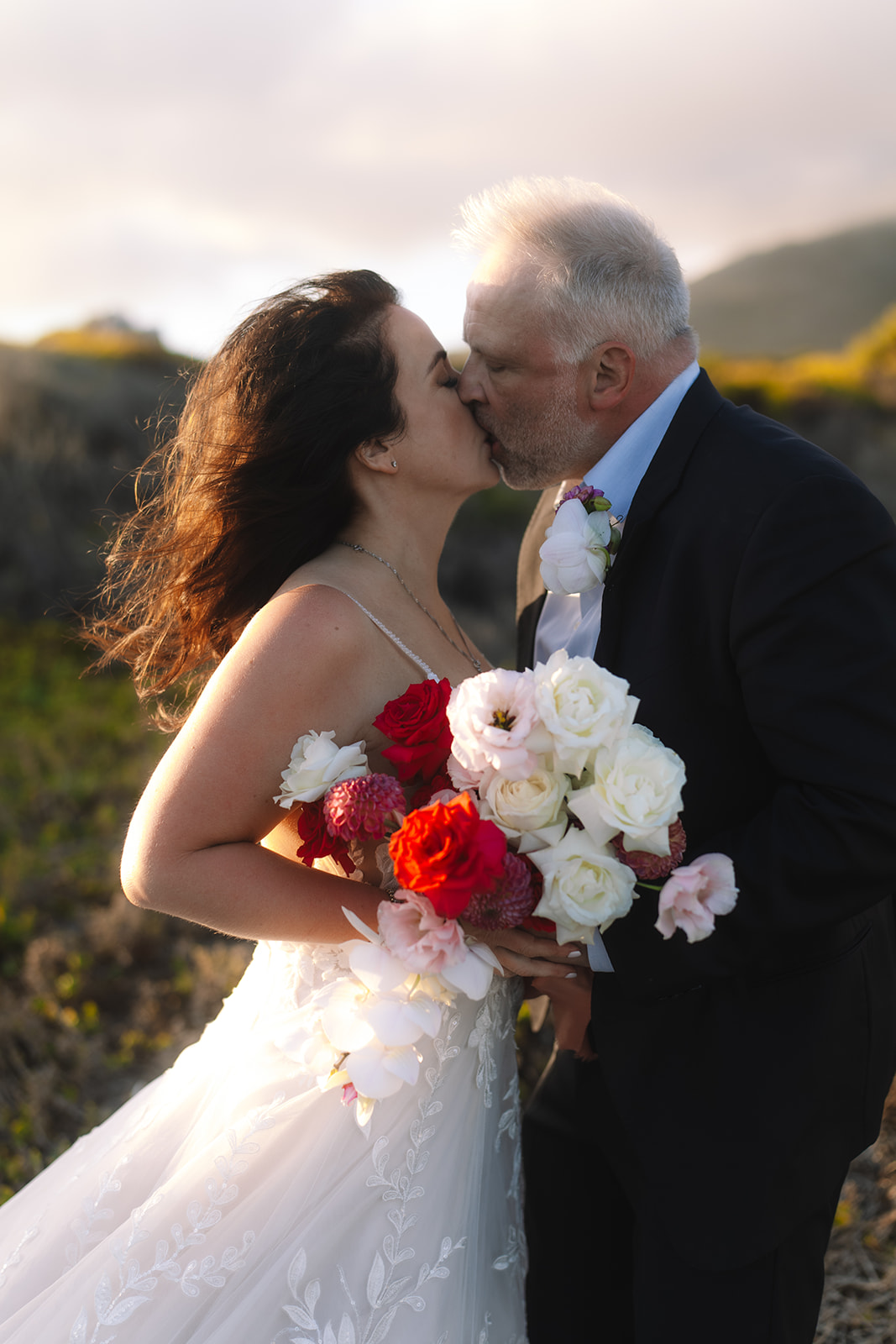 Golden hour kiss during a stony point nature reserve wedding in Betty’s Bay