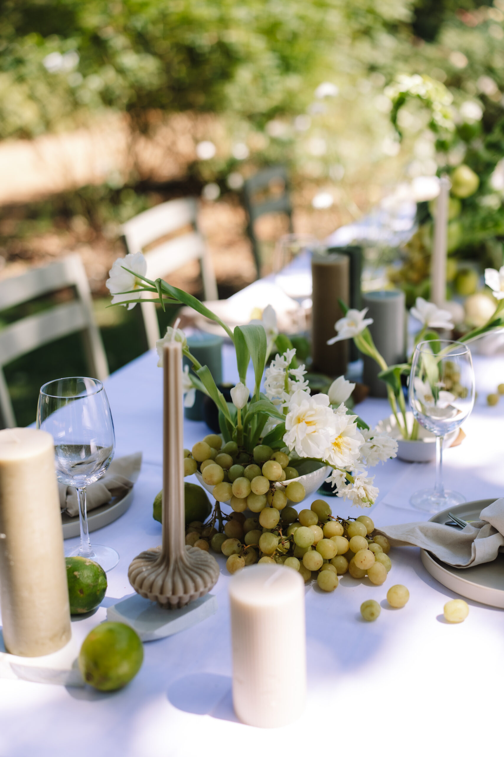 Romantic outdoor tablescape set for an intimate Cape Winelands honeymoon dinner in South Africa.