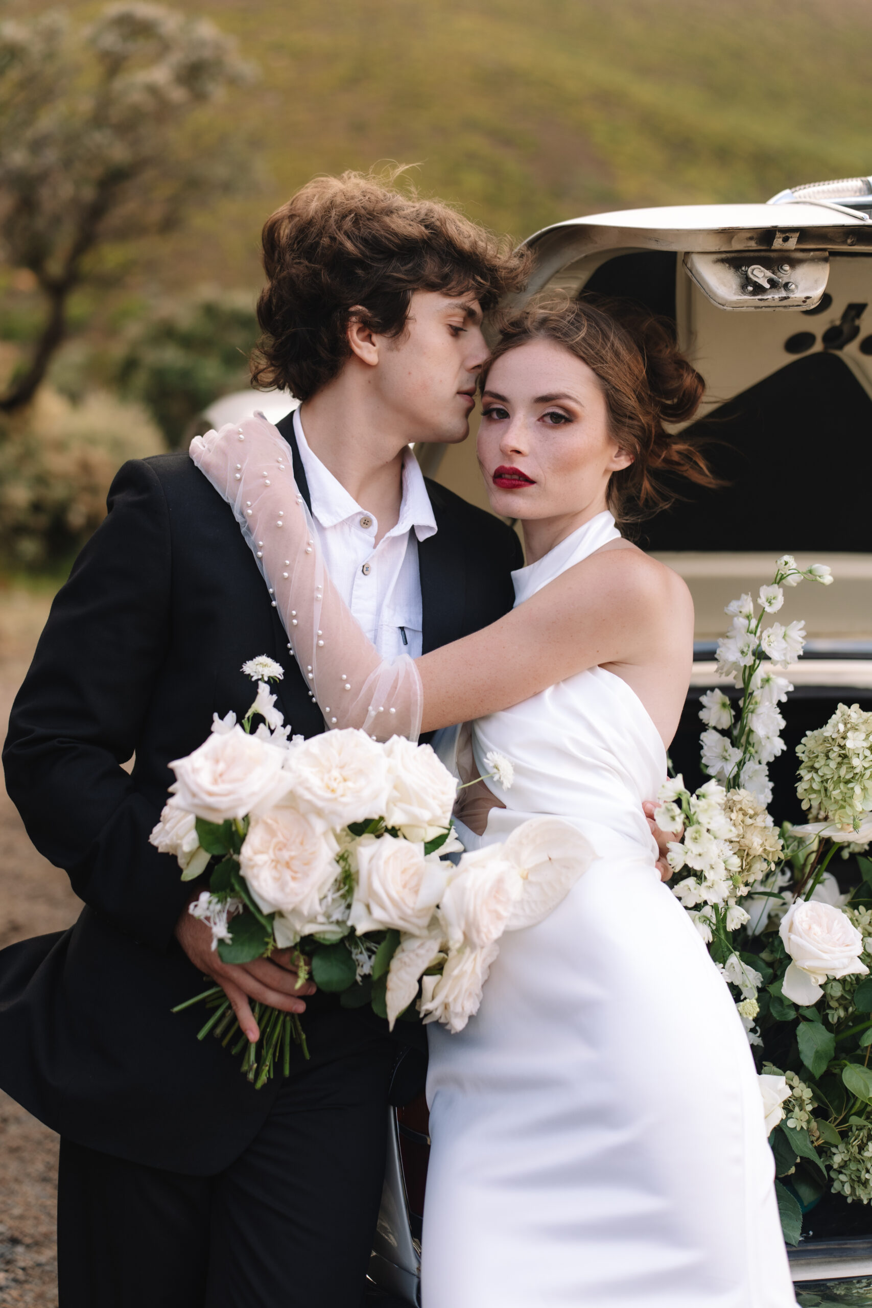Romantic editorial portrait of bride and groom during their Cape Town honeymoon in South Africa.