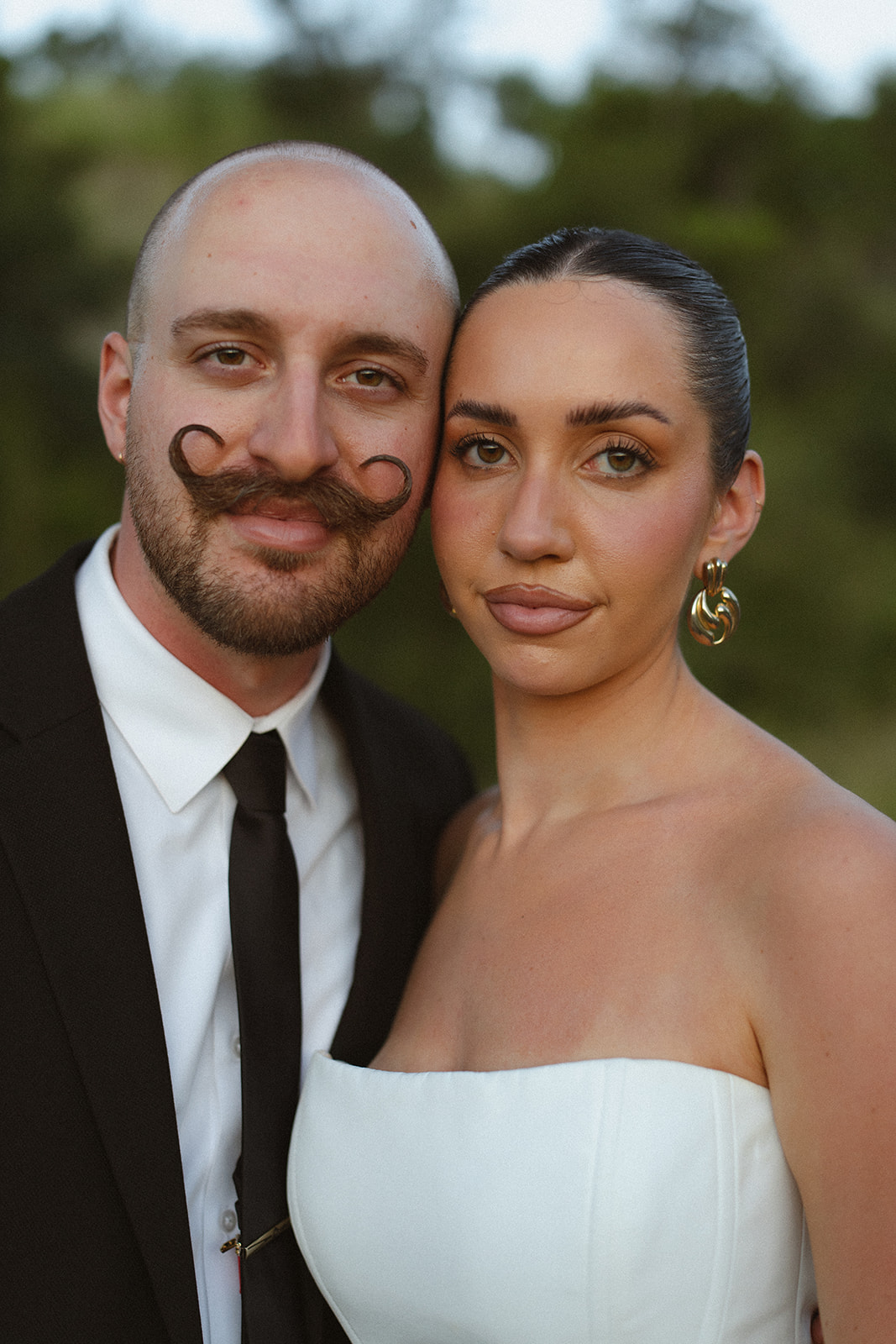 Bride and groom portrait in the African bush after they elope in South Africa
