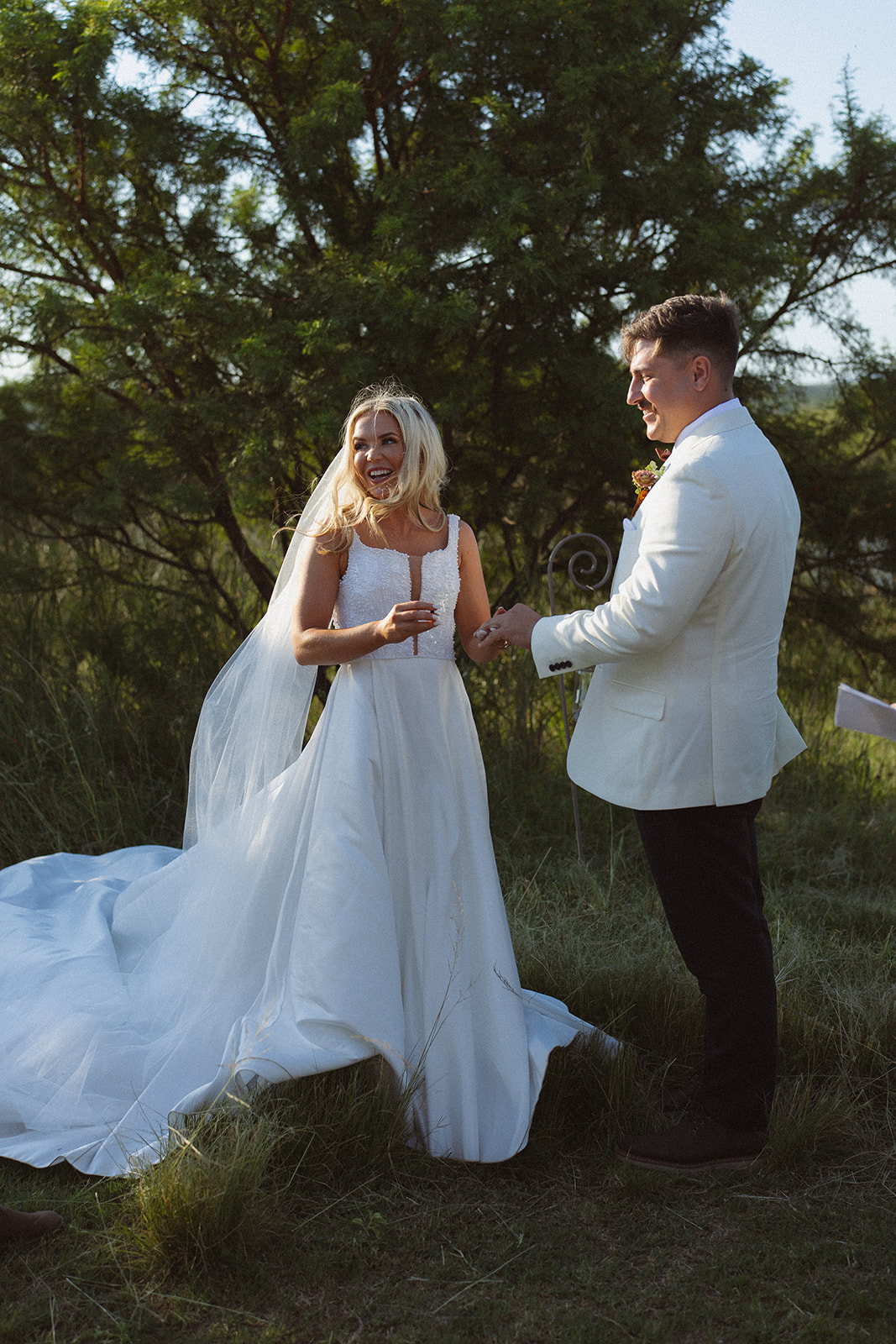 Bride laughing during wedding ceremony in a private game reserve in South Africa