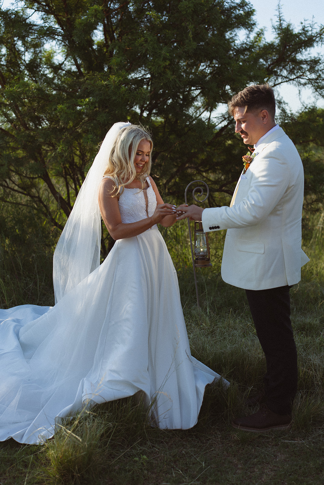 Bride and groom exchanging rings during an intimate outdoor wedding ceremony in South Africa
